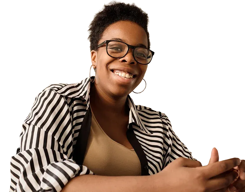 A smiling Samata Health team member wearing glasses and a striped shirt.